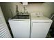 Bright laundry room featuring a modern washing machine and dryer set at 711 Springer Dr # 2, Lake Wales, FL 33853