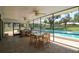 The screened patio overlooks the pool and backyard, providing a relaxing outdoor space at 711 Springer Dr # 2, Lake Wales, FL 33853