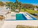 Aerial view of the in-ground swimming pool with outdoor seating area at 1800 N Scenic Hwy, Babson Park, FL 33827