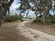 Charming home surrounded by trees at 2134 R E Byrd Rd, Frostproof, FL 33843