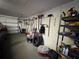 A garage filled with various items, including tools and tires, showing ample storage space at 2134 R E Byrd Rd, Frostproof, FL 33843