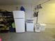 Storage area features a refrigerator and freezer, offering additional space at 2134 R E Byrd Rd, Frostproof, FL 33843