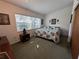 Neutral bedroom with natural light and ceiling fan at 2263 Lake Reedy N Blvd, Frostproof, FL 33843