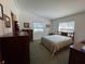 This bedroom has two windows that provide natural lighting at 2263 Lake Reedy N Blvd, Frostproof, FL 33843