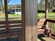 Cozy gazebo on a dock, featuring wooden benches and serene views of the surrounding waterfront property at 2263 Lake Reedy N Blvd, Frostproof, FL 33843