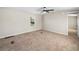 Bedroom with neutral walls, carpet flooring, and a ceiling fan at 2391 Buck Board Trl, Lake Wales, FL 33898