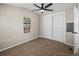 Bedroom featuring closet, carpet and a ceiling fan at 2391 Buck Board Trl, Lake Wales, FL 33898