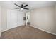 Bedroom featuring closet, carpet and a ceiling fan at 2391 Buck Board Trl, Lake Wales, FL 33898