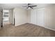 Bedroom featuring closet, fan, neutral paint, and carpet at 2391 Buck Board Trl, Lake Wales, FL 33898