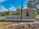 Charming home featuring a covered back porch perfect for relaxation and enjoying the outdoors at 2391 Buck Board Trl, Lake Wales, FL 33898