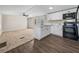 Open-concept kitchen featuring stainless sink and marble countertop at 2391 Buck Board Trl, Lake Wales, FL 33898