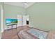 Spacious main bedroom with high ceilings and wooden flooring at 2616 Huntington Ct, Kissimmee, FL 34743