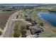 Expansive aerial view of waterfront property with mature landscaping and neighboring homes at 2656 S Scenic Hwy, Lake Wales, FL 33898