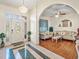 Bright foyer featuring tile and hardwood flooring leading into the living room at 2656 S Scenic Hwy, Lake Wales, FL 33898