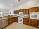 Spacious kitchen with oak cabinets and stainless steel appliances at 2656 S Scenic Hwy, Lake Wales, FL 33898