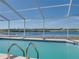 Pool with view of lake and blue skies at 2656 S Scenic Hwy, Lake Wales, FL 33898