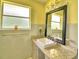 Bright bathroom with a stylish countertop and modern fixtures at 301 S Clinch Lake Blvd, Frostproof, FL 33843