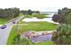 Community amenities with lake access, a white sand beach, and lush landscaping at 301 S Clinch Lake Blvd, Frostproof, FL 33843