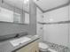 Bathroom with a modern vanity and a walk-in shower featuring stylish tile accents at 3123 Mar Lisa Cove Rd, Lake Wales, FL 33898