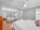 Bedroom showcasing a sliding mirror closet reflecting the light and airy interior at 3123 Mar Lisa Cove Rd, Lake Wales, FL 33898