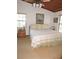 Bedroom featuring hardwood ceiling, ceiling fan, and matching wooden furniture at 3567 Red Oak Ct, Lake Wales, FL 33898