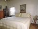 Bedroom featuring hardwood ceiling, ceiling fan, and matching wooden furniture at 3567 Red Oak Ct, Lake Wales, FL 33898