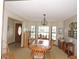 Dining room area featuring lots of natural light and seating for eight at 3567 Red Oak Ct, Lake Wales, FL 33898