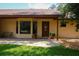 Inviting front entrance with decorative plants and covered entry at 3567 Red Oak Ct, Lake Wales, FL 33898