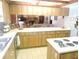 Bright kitchen featuring an eat-in bar and lots of countertop space for meal preparation at 3567 Red Oak Ct, Lake Wales, FL 33898