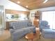 Comfortable living room showcasing a view into the open kitchen and eat-in bar at 3567 Red Oak Ct, Lake Wales, FL 33898
