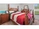 Bedroom with a wooden bed frame and furniture at 4833 Drake Ave, Lakeland, FL 33811