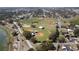 Real estate aerial view showcasing neighborhood baseball fields and the surrounding neighborhood at 711 Springer Dr # 9, Lake Wales, FL 33853