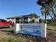 Lakeshore North Condominiums sign with a view of the building in the background at 711 Springer Dr # 9, Lake Wales, FL 33853