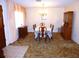 Formal dining room with chandelier and elegant furnishings at 9 Silver Sand Rd, Frostproof, FL 33843