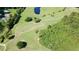 Picture of the golf course and surrounding lush greenery at 1077 Medinah Way, Winter Haven, FL 33884