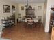 Inviting dining room featuring tile flooring, wooden furniture, and a display cabinet at 1077 Medinah Way, Winter Haven, FL 33884