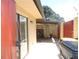 Rear porch including open storage and covered area at 1077 Medinah Way, Winter Haven, FL 33884
