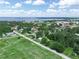 Aerial view showcasing the property's proximity to the water and surrounding neighborhood at 111 D St, Frostproof, FL 33843