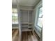 Bedroom closet features multiple shelves, lots of room, and natural lighting at 111 D St, Frostproof, FL 33843