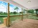 Outdoor porch features wooden decking and views of the surrounding neighborhood at 111 D St, Frostproof, FL 33843