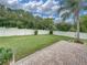 Large, fenced backyard with brick patio, perfect for outdoor entertaining at 1144 Cephia St, Lake Wales, FL 33853