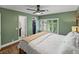 Cozy bedroom boasts a view of a closet and a window with privacy shutters at 1144 Cephia St, Lake Wales, FL 33853