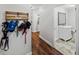 Inviting hallway leading to bathroom featuring decorative elements and neutral decor at 1144 Cephia St, Lake Wales, FL 33853