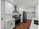 Bright kitchen featuring modern appliances, subway tile, and quartz countertops at 1144 Cephia St, Lake Wales, FL 33853