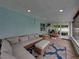 The screened-in porch is an inviting space for relaxation and entertaining at 1144 Cephia St, Lake Wales, FL 33853