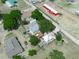 Wide aerial view of the property and surrounding area, highlighting the home's location and lot size at 1351 Smokey Rd, Lake Wales, FL 33859