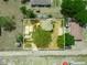 Aerial view of the property showcasing the layout, large backyard, and surrounding greenery at 1351 Smokey Rd, Lake Wales, FL 33859