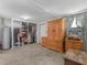 Unfinished basement featuring ample storage space, water heater, and window at 1351 Smokey Rd, Lake Wales, FL 33859