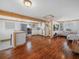 Open concept with hardwood floors and lots of space for relaxing and cooking at 1351 Smokey Rd, Lake Wales, FL 33859