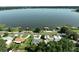 Waterfront lake view of waterfront canal homes with private docks, offering a serene living experience at 1422 Avenue H Sw, Winter Haven, FL 33880